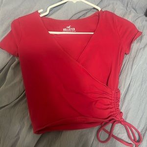 adjustable crop top from hollister.size small.red